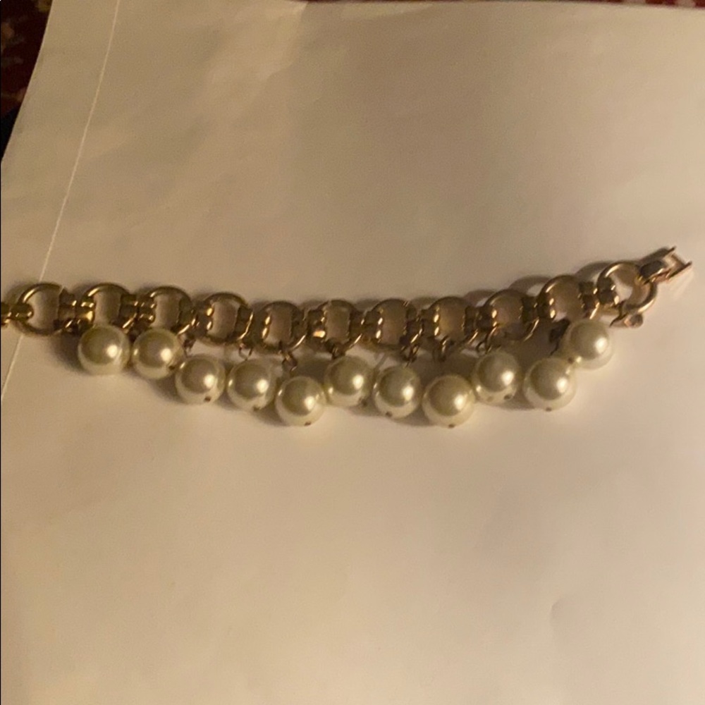 Gold loop bracelet with dangling pearls